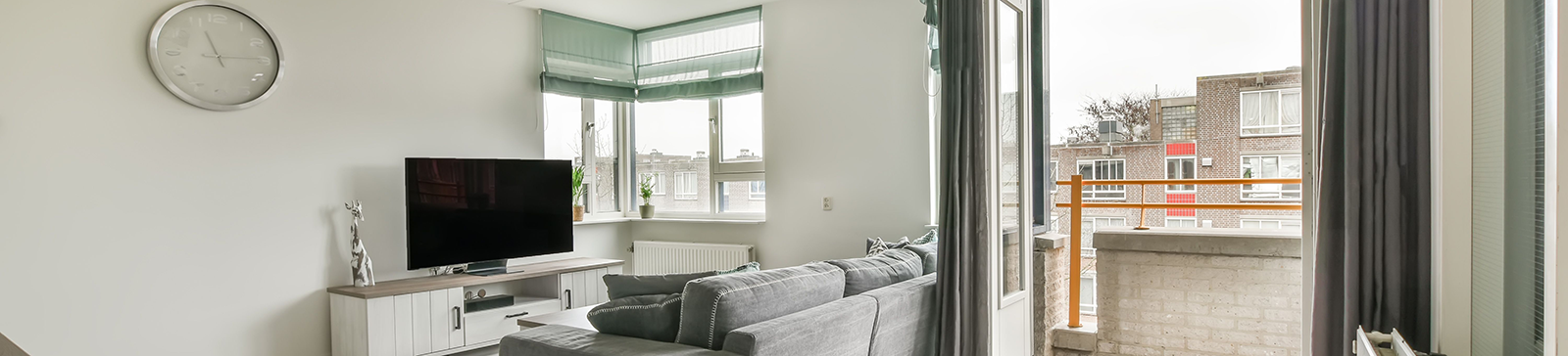 Elegant Green Roman Shades and Drapery in San Diego